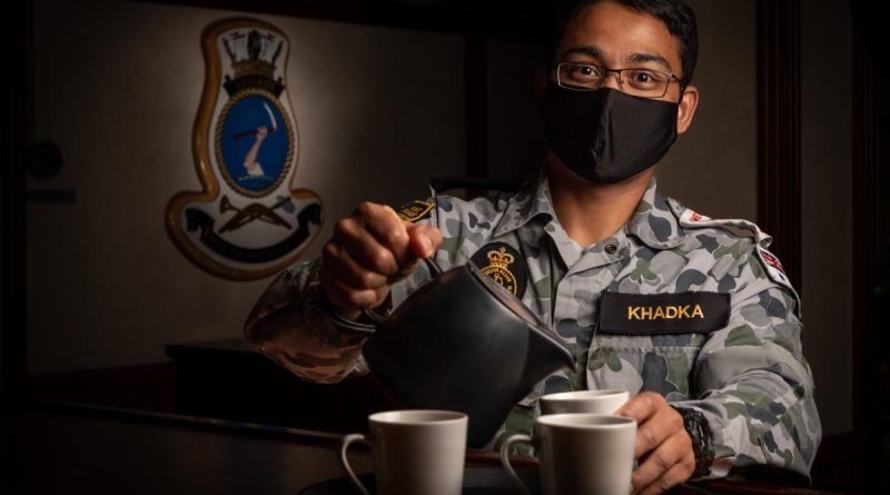 Navy sailor Seaman Dhan Khadka in HMAS Adelaide's wardroom during his deployment on Operation Tonga Assist 2022. Story and photo by Leading Seaman David Cox.