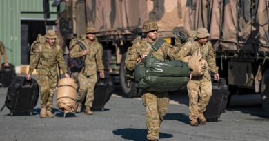 Army officer Lieutenant Thomas West, front, and other soldiers load gear onto trucks at Gallipoli Barracks in Brisbane in preparation to deploying to Gympie as part of Operation Flood Assist 2022. Story by Captain Taylor Lynch. Photo by Corporal Nicole Dorrett.