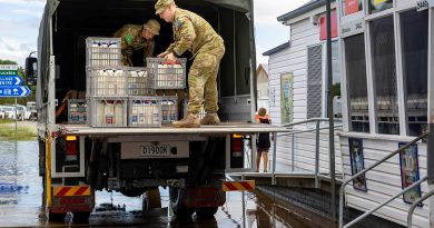 ustralian Army soldiers Private Riva Brown and Private Jamie Morrison from 41st Battalion, Royal New South Wales Regiment, unload crates of refrigerated milk to Ulmarra on the New South Wales mid-north coast. Story by Major Jesse Robilliard. Photo by Corporal Dustin Anderson.