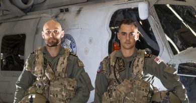 Leading Seamen Aircrew Michael Bennet (left) and Leading Seamen Aircrew Liam Sulley at 816 Squadron at HMAS Albatross, Nowra, after completing their rescue mission during Operation Flood Assist 2022. Story by Lieutenant Nancy Cotton. Photo by Leading Seaman Ryan Tascas.