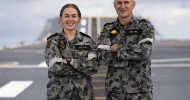 Army soldier Private Tim Melvin, right, reunites with his daughter, Navy sailor Leading Seaman Esther Melvin, on HMAS Canberra on Operation Tonga Assist 2022. Story by Lieutenant Brendan Trembath. Photo by Leading Seaman Daniel Goodman.