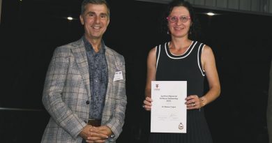 Air Commander Australia Air Vice-Marshal Joe Iervasi presents a certificate to Dr Bianca Capra as the Spitfire Memorial Defence Fellowship 2021 recipient during the 60th anniversary of the Spitfire Association. Story by Flight Lieutenant Dion Isaacson. Photo by Sergeant Oliver Carter.