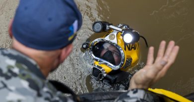 Royal Australian Navy clearance diver Able Seaman Jake Phillips prepares to survey ferry terminal pylons along the Brisbane River as part of Operation Flood Assist 2022. Story by Captain Simon Hampson. Photo by Corporal Julia Whitwell.