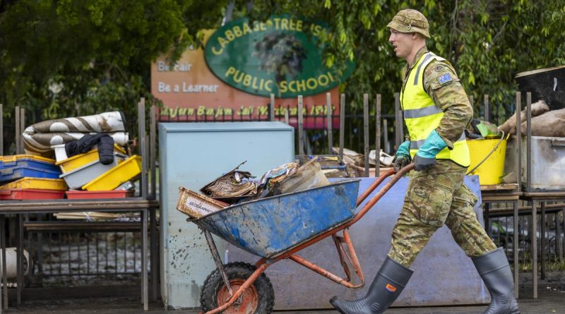 An Army soldier from 5th Engineer Regiment assists with clean up at Cabbage Tree Island Primary School in northern NSW as part of Operation Flood Assist 2022. Story by Captain Catalina Martinez-Pinto. Photo by Corporal Dustin Anderson.