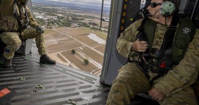 Commander of the Operation Flood Assist Joint Task Force, Lieutenant General David Thomae (right), surveys flood-affected areas in the greater Sydney region from an Army MRH-90 Taipan helicopter. Photo by Corporal Julia Whitwell.