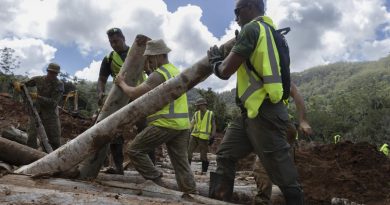 Republic of Fiji Military Forces and Australian Army soldiers work together to help clear debris and rebuild an Upper Wilsons Creek access road damaged by floodwaters in northern New South Wales. Photo by Corporal Sagi Biderman.