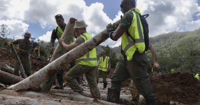 Republic of Fiji Military Forces and Australian Army soldiers work together to help clear debris and rebuild an Upper Wilsons Creek access road damaged by floodwaters in northern New South Wales. Photo by Corporal Sagi Biderman.