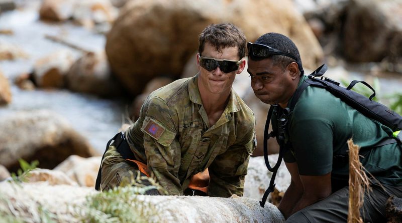 Australian Army and Republic of Fiji Military Forces personnel work together to rebuild an Upper Wilsons Creek access road damaged by floodwaters in northern New South Wales. Story by Captain Annie Richardson. Photo by Corporal Sagi Biderman.