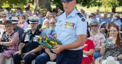 Wing Commander Shane Smith lays a wreath during the bombing of Katherine commemoration ceremony at Katherine, Northern Territory. Story by Flight Lieutenant Dee Irwin. Photo by Sergeant Pete Gammie.