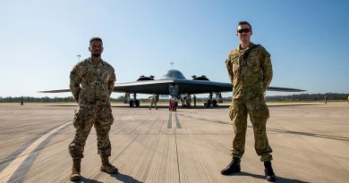 United States Air Force Senior Airman Reginald Dormeville from 509th Security Forces Squadron (left) and Royal Australian Air Force Aircraftman James Lunney from No. 2 Security Squadron in front of a United States Air Force B-2 Spirit aircraft from the 13th Bomb Squadron, at RAAF Base Amberley, Queensland. Photo by Leading Aircraftwoman Emma Schwenke.