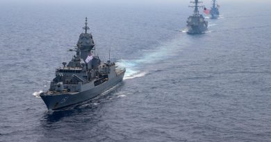 HMAS Arunta, left, sails in company with US Navy destroyer USS Momsen and Japan Maritime Self-Defense Force destroyer JS Yūdachi. Story by Lieutenant Commander Andrew Herring. Photo by US Navy Aicrewman Regnor Vondedenroth.
