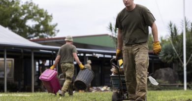 Gunner Jarrad Gardner clears debris at the flood-damaged Blakebrook Public School near Lismore, northern NSW, as part of Operation Flood Assist 2022. Story by Captain Annie Richardson and Leading Seaman Kylie Jagiello. Photo by Corporal Sagi Biderman.