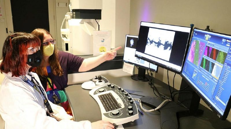 Defence Science and Technology Group scientist Sonya Slater, right, shows university student Charli Goodrich how to use equipment used in forensic analysis during Ms Goodrich's 12-month placement at Fishermans Bend, Victoria. Story by David Kilmartin.