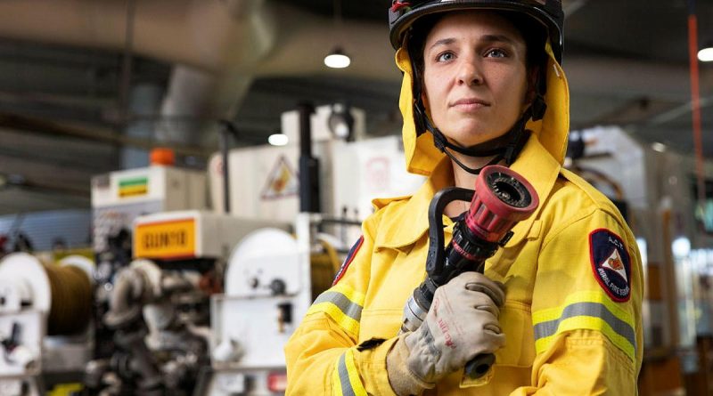 Navy marine engineering officer Lieutenant Loretta Binder is a volunteer firefighter at the Gungahlin brigade of the ACT Rural Fire Service in Canberra. Story by Angus Pagett. Photo by Petty Officer Bradley Darvill.