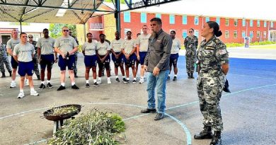 Leading Seaman Breanna Jacobs-Rochford, right, and Uncle Shane Clarke from Bunurong Land Council Aboriginal Corporation speak to Navy Indigenous Development Program participants and recruit school staff at HMAS Cerberus, Victoria. Story by Lieutenant Nancy Cotton.