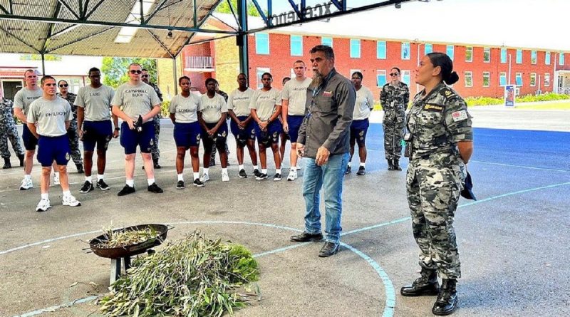 Leading Seaman Breanna Jacobs-Rochford, right, and Uncle Shane Clarke from Bunurong Land Council Aboriginal Corporation speak to Navy Indigenous Development Program participants and recruit school staff at HMAS Cerberus, Victoria. Story by Lieutenant Nancy Cotton.