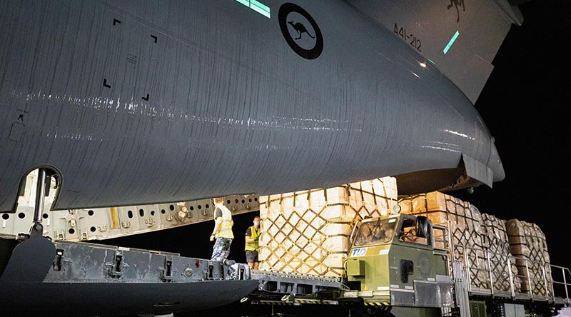 Royal Australian Air Force personnel from No. 22 Squadron load pallets of military assistance bound for Ukraine onto a C-17A Globemaster III at RAAF Base Richmond, New South Wales. Photo by Corporal Kylie Gibson.
