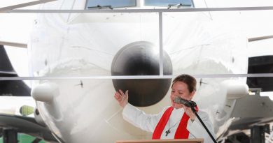 Chaplain Squadron Leader Sue Page conducts the prayer of dedication during the unveiling of the P-8A Poseidon at its new home at RAAF Base Edinburgh. Story by Flight Lieutenant Nick O’Connor. Photo by Corporal Craig Barrett.