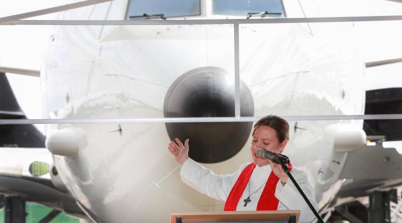 Chaplain Squadron Leader Sue Page conducts the prayer of dedication during the unveiling of the P-8A Poseidon at its new home at RAAF Base Edinburgh. Story by Flight Lieutenant Nick O’Connor. Photo by Corporal Craig Barrett.