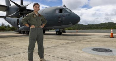 Air Force loadmaster Corporal Antonia Guterres stands on the tarmac in Palau by the C-27J Spartan aircraft she worked on during Operation Solania. Story by Flying Officer Lily Lancaster. Photo by Leading Seaman Nadav Harel.