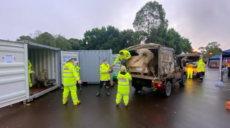 Australian Army soldiers deliver 144 sleeping bags and 54 stretchers to a Rural Fire Service base camp in Wollongbah, New South Wales, as part of continuing support to the region under Operation Flood Assist 2022.