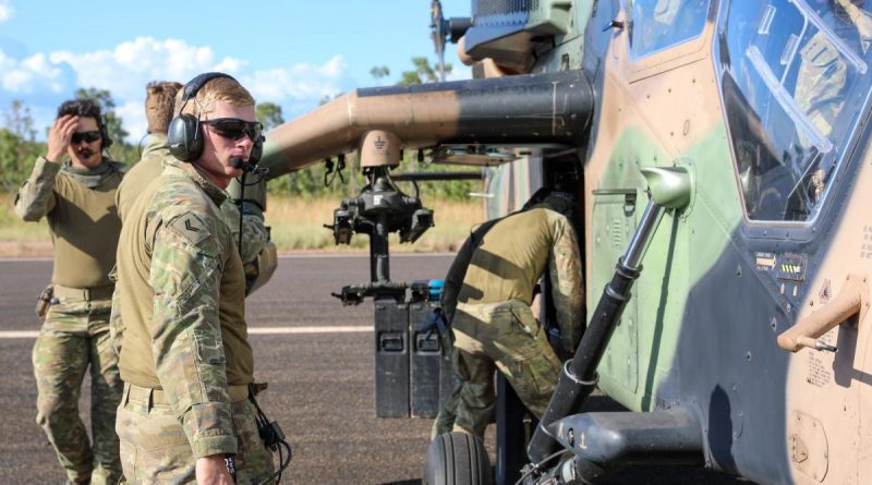 Corporal Callum Hite supervises the preparation of a Tiger armed reconnaissance helicopter for live-fire practise during Exercise Griffin Guns at Mount Bundey training area, south of Darwin. Story by Captain Carolyn Barnett. Photo by Lance Corporal Mitchell Creek.