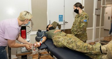 Sergant Nicole Hall from 1st Armoured Regiment donates blood at the Red Cross Lifeblood pop-up donor centre in Ballina, New South Wales, while deployed on Operation Flood Assist 2022. Story by Corporal Jacob Joseph. Photo by Leading Seaman Jarrod Mulvihill.