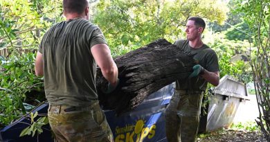 Soldiers from 1st Intelligence Battalion remove a large tree trunk as part of Legacy’s Backyard Assist program in Brisbane. Story by Captain Evita Ryan.