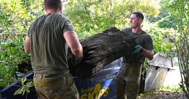 Soldiers from 1st Intelligence Battalion remove a large tree trunk as part of Legacy’s Backyard Assist program in Brisbane. Story by Captain Evita Ryan.