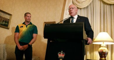 Governor-General General (retd) David Hurley congratulates Peter Brown as Australia's Invictus Games flag bearer during the farewell function at Admiralty House in Sydney. Photo by Sergeant Oliver Carter.