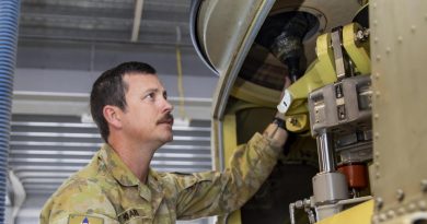 Sergeant Jason Hoare from 5th Aviation Regiment conducts maintenance on a CH-47F Chinook helicopter at RAAF Base Townsville. Photo by Corporal Lisa Sherman.
