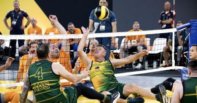 Invictus Games 2020 competitor Mark Armstrong deflects the ball during the sitting volleyball match against Netherlands at Invictus Games Park in The Hague, Netherlands. Story by Tina Langridge. Photo by Flight Sergeant Ricky Fuller.