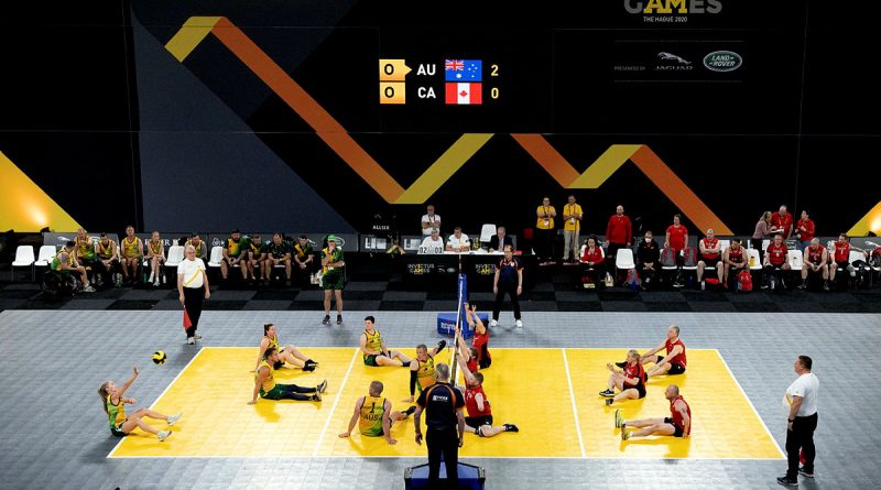 Australian Invictus Games 2020 and Canadian competitors battle it out during the sitting volleyball match at Invictus Games Park in The Hague, Netherlands. Story by Lucy Redford-Hunt. Photo by Flight Sergeant Ricky Fuller.