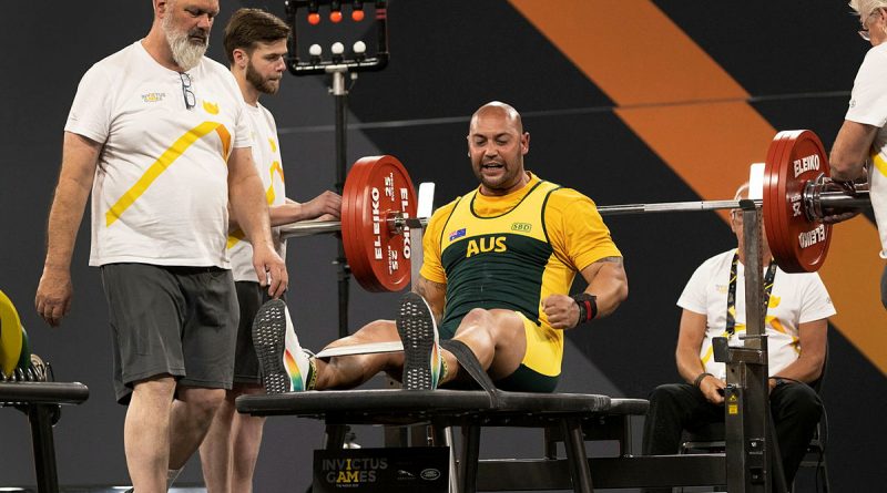 Australian Invictus Games 2020 competitor Gabriel Ramon celebrates a successful lift during the men’s heavyweight powerlifting event at Invictus Games Park in The Hague, Netherlands. Story by Lucy Redford-Hunt. Photo by Flight Sergeant Ricky Fuller.