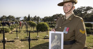 Australian Army Band musician Corporal Laura Burden holds a photo of her great-uncle, Private Richard Bainbridge Brooker who served at Gallipoli in 1915. Story by Lieutenant Anthony Martin. Photo by Corporal David Cotton.