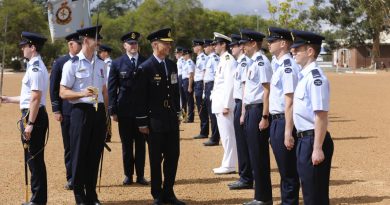 Commander of Air Combat Group, Air Commodore Tim Aslop, centre, talks with a Air Force officer from No. 265 PC-21 Australian Defence Force pilots course during the graduation ceremony at RAAF Base Pearce, Western Australia. Story by Peta Magorian. Photo by Chris Kershaw.
