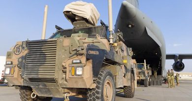 A Bushmaster protected mobility vehicle is loaded onto a Royal Australian Air Force C-17 Globemaster in Kabul, Afghanistan. Photo by Corporal Tristan Kennedy.