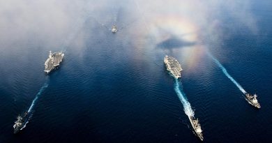 The aircraft carrier USS John C. Stennis and the aircraft carrier USS George Washington underway in the Andaman Sea with ships from their carrier strike groups. US Navy photo by Mass Communication Specialist 3rd Class Kenneth Abbate.