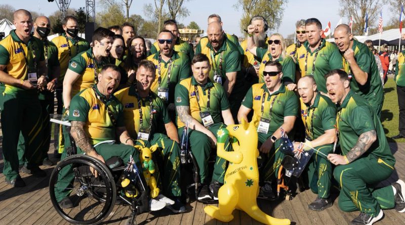 Invictus Games 2020 Team Australia members give an Aussie cheer as they wait to enter the stadium for the Invictus Games 2020 opening ceremony in The Hague, Netherlands. Story by Lucy Redford-Hunt. Photo by Flight Sergeant Ricky Fuller.