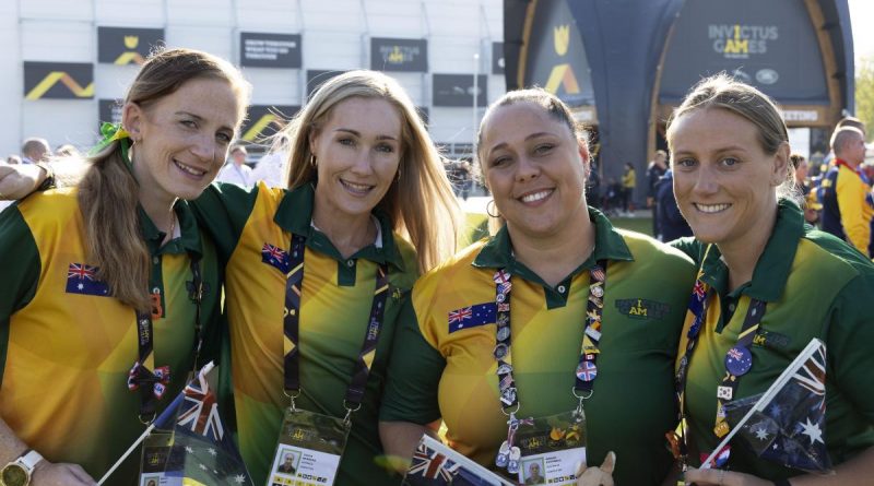 Australian Invictus Games 2020 competitors Emilea Mysko, left, Taryn Barbara, Sarah Petchell and Emma Murfet ready for the opening ceremony. Story by Lucy Redford-Hunt. Photo by Flight Sergeant Ricky Fuller.