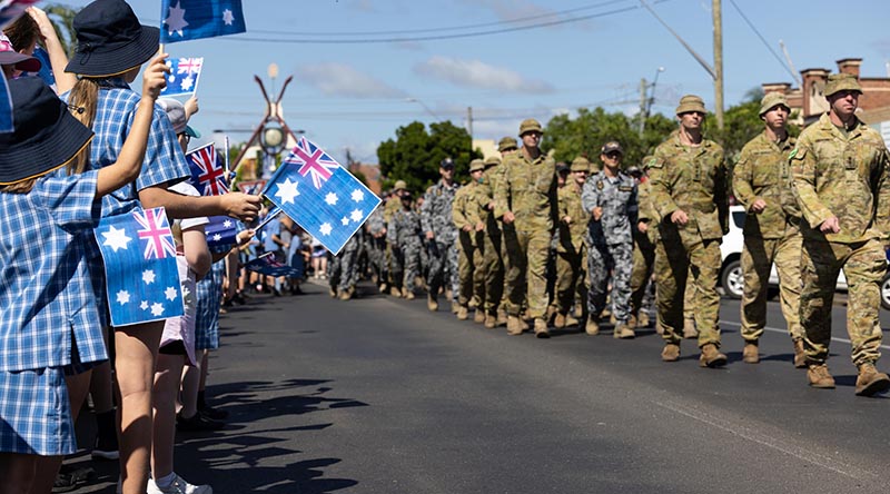 Australian Defence Force personnel deployed on Operation Flood Assist 2022 march down Casino's main street to the applause of locals after assisting northern New South Wales communities respond to the devastating floods. Corporal Jonathan Goedhart.