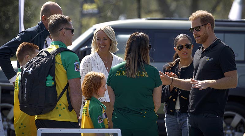 The Duke and Duchess of Sussex meet with Australian Invictus Games 2020 competitor and Royal Australian Navy sailor Leading Seaman Vanessa Broughill (centre right) and her family during the Land Rover driving challenge at Invictus Games Park in The Hague, Netherlands. Photo by Sergeant Oliver Carter.