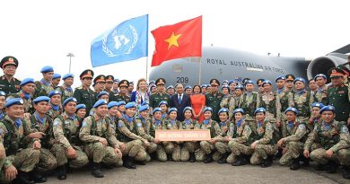 President of Vietnam Nguyễn Xuân Phúc (centre), and Australian Ambassador to Vietnam Robyn Mudie (centre right), farewell Vietnamese peacekeepers in Hanoi, deploying to the United Nations mission in South Sudan on a Royal Australian Air Force C-17A Globemaster III. Photo supplied. Left to right: Ms Caitlin Wiesen-Antin (white scarf), United Nations Acting Resident Coordinator for Vietnam; Senior General Phan Văn Giang, Vietnam’s Minister for National Defence; President Nguyễn Xuân Phúc; Ms Mudie.