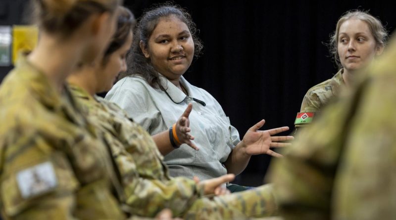A student from Thuringowa State High School speaks to personnel from 3rd Brigade during a mentoring program. Story by Captain Diana Jennings. Photo by Corporal Brodie Cross.