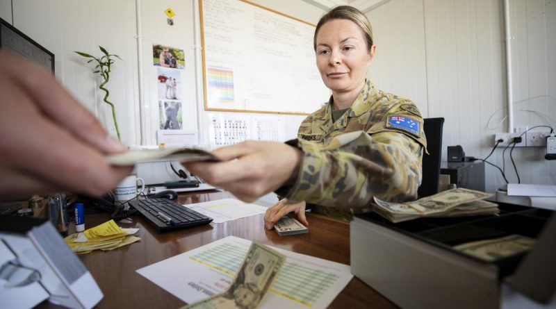 Sergeant Stephanie Brooks concentrates on the task at hand while working at South Camp in Sharm el-Sheikh, Egypt. Story and photo by Petty Officer Lee-Anne Cooper.