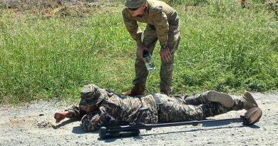 Lance Corporal Bailey Young and a soldier from the Timor-Leste Defence Force during mine patrolling and detecting training in Timor-Leste as part of the Defence Cooperation Program. Story by Captain Jessica O’Reilly.