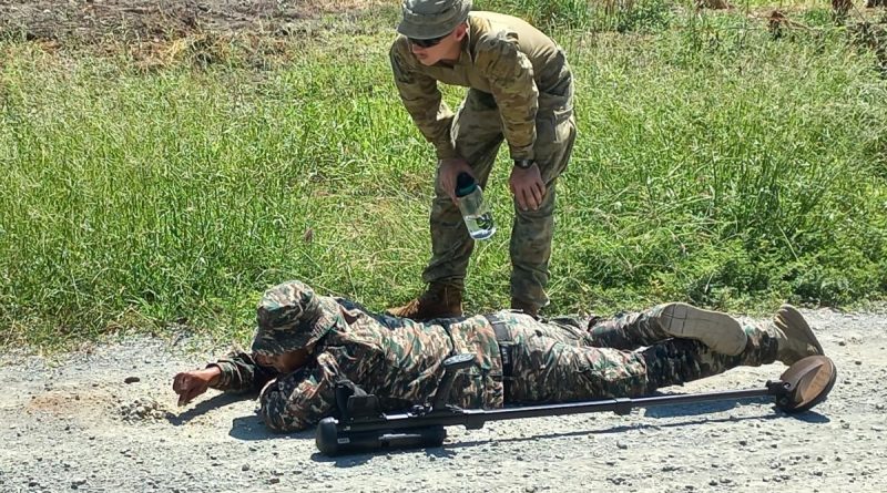 Lance Corporal Bailey Young and a soldier from the Timor-Leste Defence Force during mine patrolling and detecting training in Timor-Leste as part of the Defence Cooperation Program. Story by Captain Jessica O’Reilly.