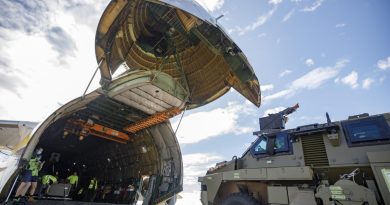 An Australian Government-donated Bushmaster protected mobility vehicle bound for Ukraine is loaded onto an Antonov AN-124 cargo aircraft at RAAF Base Amberley in Queensland. Story by Lucy Benjamin.