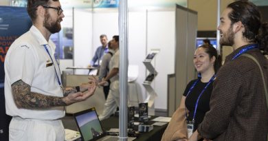 Petty Officer Electronics Technician Submarines Michael Budden works at the Defence Force Recruiting stand during the Royal Australian Navy Sea Power Conference as part of Indo Pacific 2022 held in Sydney.