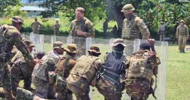 Australian Army soldiers provide guidance to PNGDF soldiers about creating a shield wall during population protection and control training as part of Exercise Olgeta Warrior. Story by Captain Jessica O’Reilly.
